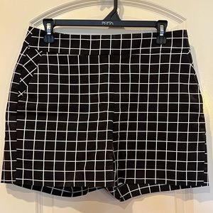 WHBM black shorts with white stripes in a checkered pattern.  Size 6 Inseam 5”